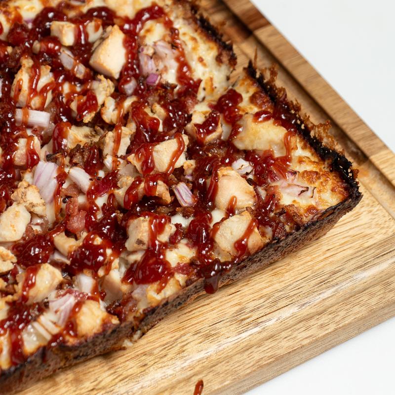 Motor City BBQ Detroit-style pizza with chicken and red onions